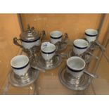 A WEIDMANN ITALIAN SIX CUP AND SAUCER SET WITH SPOONS AND A LIDDED JAR