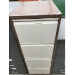 A FOUR DRAWER BISLEY METAL FILING CABINET