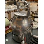 A STAINLESS STEEL MILK CHURN