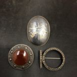 THREE SILVER BROOCHES