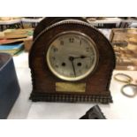 A 1927 HALF MOON PRESENTATION WOODEN MANTLE CLOCK