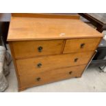 A SATINWOOD CHEST OF TWO LONG AND TWO SHORT DRAWERS