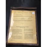 A GERMAN WWII LEATHER DOCUMENT