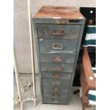 A VINTAGE BISLEY NINE DRAWER FILING CABINET TO INCLUDE LARGE QUANTITY OF CONTENTS IN EACH DRAWER