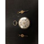 A LADIES 935 SILVER POCKET WATCH WITH TWO KEYS