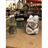 TWO ORIENTAL STYLE FIGURES, ONE GREEN SOAPSTONE AND ANOTHER CERAMIC