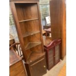 A MODERN NARROW OAK CORNER UNIT AND A WALL DISPLAY CABINET