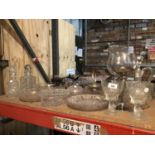 AN ARRAY OF ASSORTED GLASSWARE TO INCLUDE THREE DECANTERS AND CUT GLASS