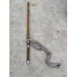 A SPLIT CANE TWO PIECE FISHING ROD AND ROD BAG