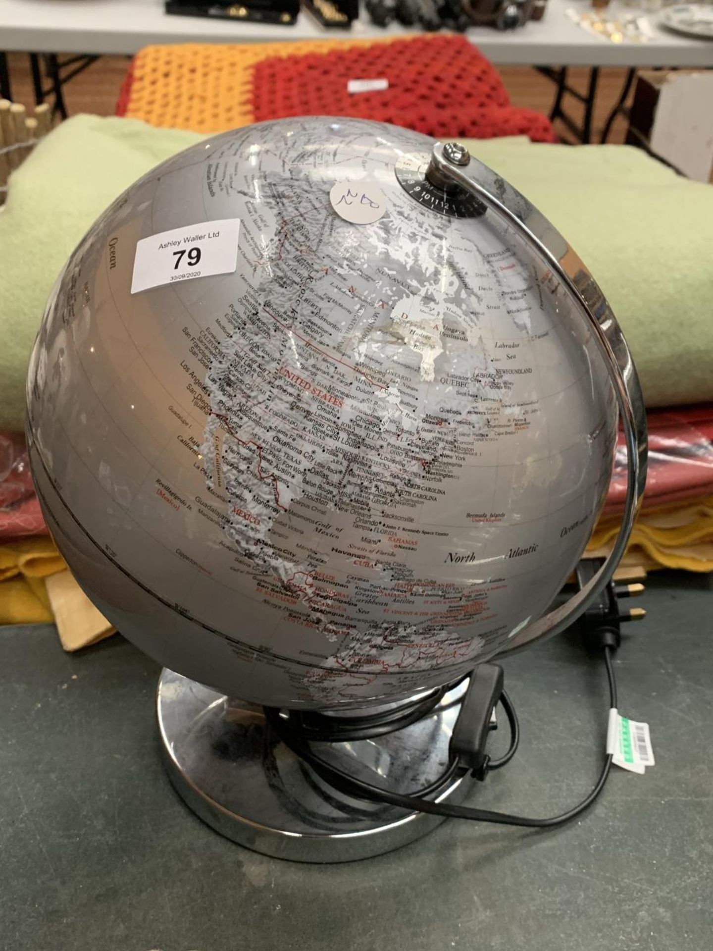 A SILVER LIGHT-UP GLOBE