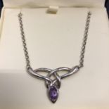 A ROYAL MINT 925 SILVER PENDANT SET WITH A SINGLE AMETHYST ON A 925 SILVER NECKLACE