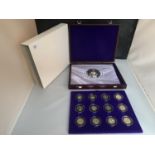 A SET OF TWELVE COIN 50P 50TH ANNIVERSARY OF THE CORONATION SILVER PROOF SET WITH WOODEN