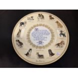 AN AYNSLEY COLLECTORS PLATE 'THE DOG'