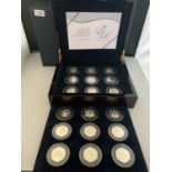 A SET OF 18 SILVER PROOF £5 COINS - THE QUEENS DIAMOND WEDDING ANNIVERSARY IN WOODEN PRESENTATION