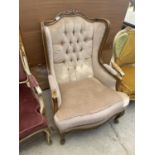 A CONTINENTAL STYLE WINGED EASY CHAIR