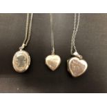 THREE SILVER LOCKETS