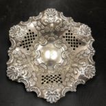 AN ORNATE FLUTED HALLMARKED SILVER DISH