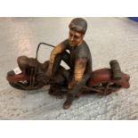 A RESIN MOTORCYCLE ORNAMENT WITH SEATED FIGURE