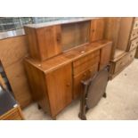 A NATHAN WALNUT SIDEBOARD WITH CUPBOARDS AND SLIDING GLAZED DOORS TO UPPER PORTION, 54" WIDE