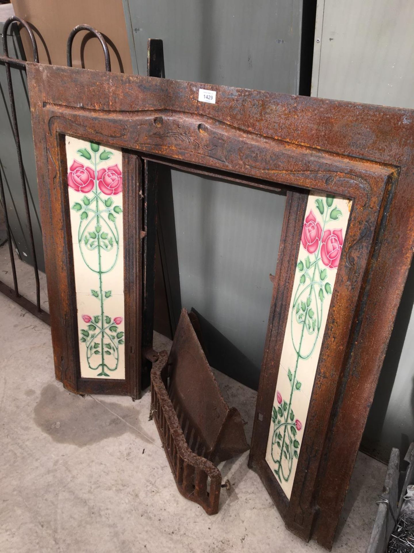 A VICTORIAN TILED FIRE PLACE