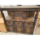 AN OAK JACOBEAN STYLE COURT CUPBOARD, 54" WIDE