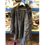 A MINK LADIES DARK BROWN THREE QUARTER LENGTH FUR COAT