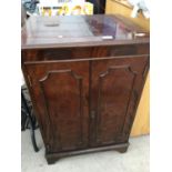 A INLAID MAHOGANY STEREO CABINET