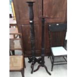 A LATE 19TH CENTURY MAHOGANY TORCHERE WITH TURNED, CARVED AND FLUTED COLUMNS