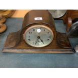 A MAHOGANY NAPOLEAN HAT MANTLE CLOCK