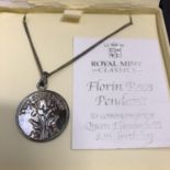 A 925 SILVER FLORIN ROSE PENDANT ON A 925 SILVER NECKLACE