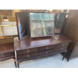 A STAG DRESSING TABLE WITH TRIPLE MIRROR, 52" WIDE