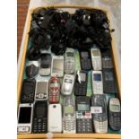 A LARGE ASSORTMENT OF MOBILE PHONES TO INCLUDE CHARGERS FOR SUCH