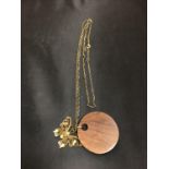 A WOODEN BUTTERFLY NECKLACE