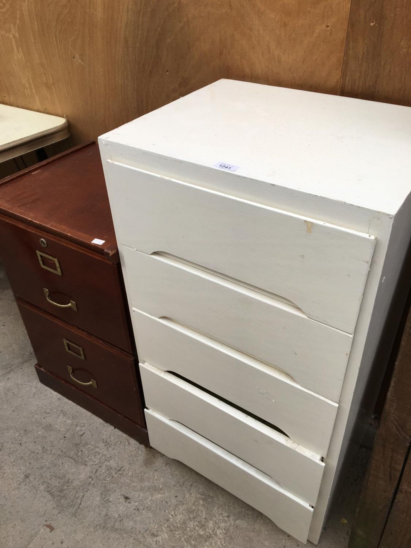 A 2 DRAWER WOODEN FILING CABINET WITH BRASS WARE AND A FIVE DRAWER WHITE WOODEN CHEST OF DRAWERS