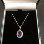 AN AMETHYST STONE PENDANT ON A 9CT GOLD NECKLACE 2 GRAMS