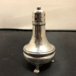 A SILVER SALT SHAKER