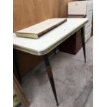 A RETRO FORMICA TOP KITCHEN DINING TABLE WITH EXTRA LEAF WITH METAL SUPPORTING LEGS
