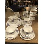 A SIX PLACE SETTING OF COLCLOUGH CHINA TO INCLUDE FOUR STAFFORDSHIRE COFFEE MUGS