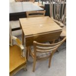 A MODERN DROP-LEAF KITCHEN TABLE AND TWO CHAIRS