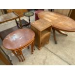 A YEW WOOD NEST OF THREE TABLES, A BEDSIDE LOCKER AND AN OVAL YEW WOOD COFFEE TABLE
