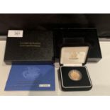 A 2005 GOLD PROOF SOVEREIGN IN WOODEN PRESENTATION BOX WITH CERTIFICATE