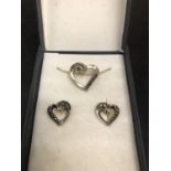 A BOXED SILVER HEART NECKLACE SET