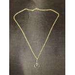 A 9CT GOLD SOLITAIRE NECKLACE