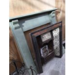 A VICTORIAN TILED BACK FIREPLACE WITH PAINTED PINE SURROUND