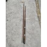 A SPLIT CANE THREE PIECE FISHING ROD