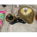 A SET OF SALTER NO 56 BRASS AND CAST KITCHEN SCALES AND WEIGHTS