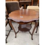 AN EDWARDIAN MAHOGANY TWO TIER OCCASIONAL TABLE