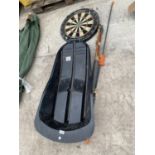 A SNOW SLEDGE, BRISTLE DART BOARD, BOW AND ARROWS