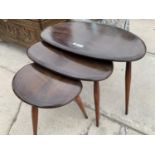 A NEST OF THREE ELM ERCOL PEBBLE TABLES