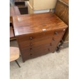 A 19TH CENTURY MAHOGANY CHEST COMMODE WITH FOUR SHAM DRAWERS AND ORIGINAL PEWTER CHAMBER POT